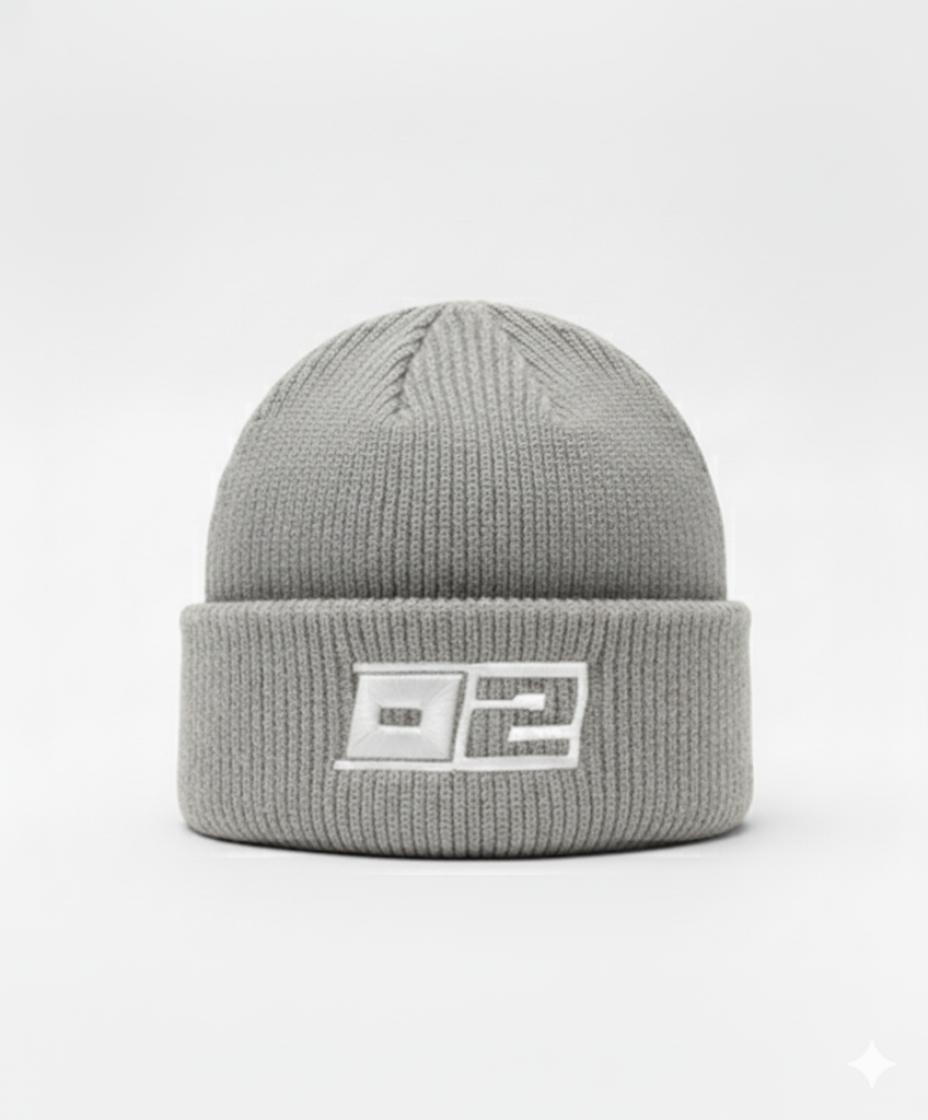 0-2 Brand™ Knit Beanie Light Graywith white 3D puff embroidered 0-2 badge on cuff, heavyweight rib knit for cold-weather wear.