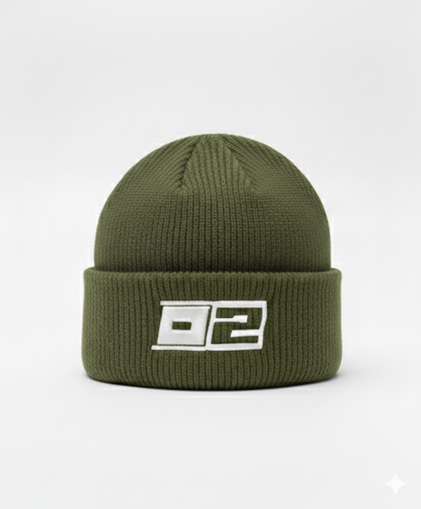 0-2 Brand™ Knit Beanie Olive Green with white 3D puff embroidered 0-2 badge on cuff, heavyweight rib knit for cold-weather wear.